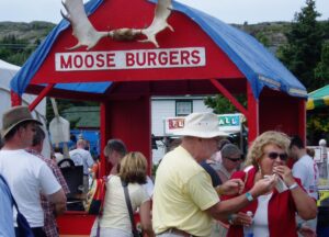 Summer festivals are one place to find Newfoundland's delicious but scarce mooseburgers. Photo: Jonathan Tourtellot